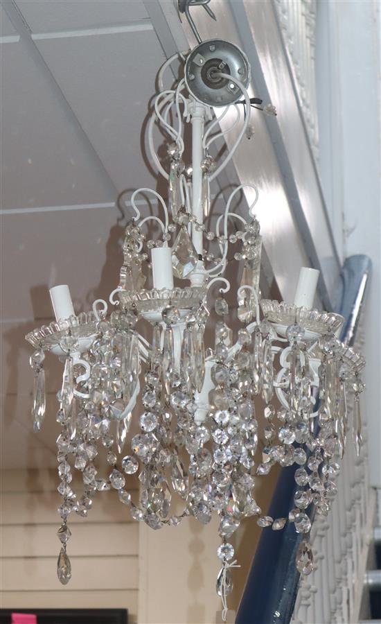 A painted metal six branch electrolier, hung glass drops